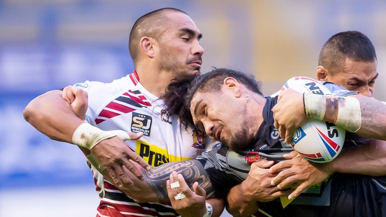 Picture by Allan McKenzie/SWpix.com - 29/08/2020 - Rugby League - Betfred Super League - Wigan Warriors v Castleford Tigers - Halliwell Jones Stadium, Warrington, England - Wigan's Thomas Leuluai tackles Castleford's Jesse Sene-Lefao.