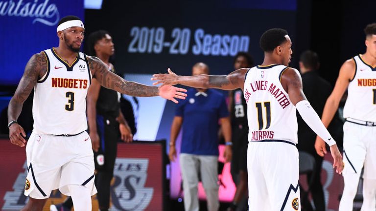 Torrey Craig of the Denver Nuggets high fives his teammate during the game against the LA Clippers during Game Two of the Western Conference Semi-finals