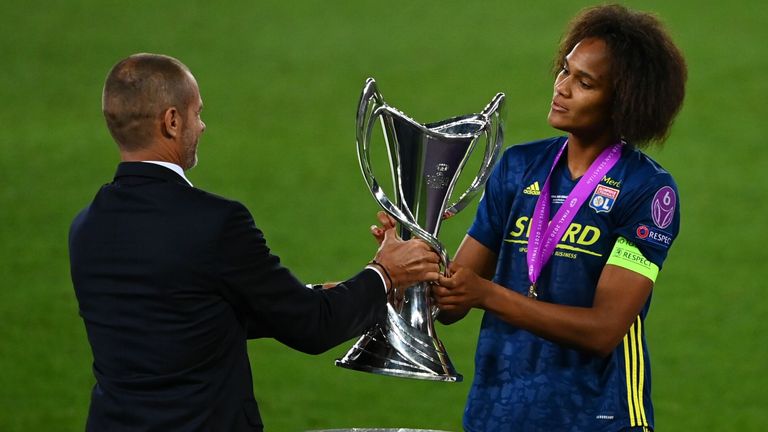 Ceferin was on trophy-giving duties in August, here handing the Women's Champions League trophy to Lyon captain Wendie Renard 