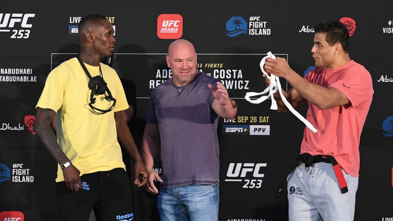 In this handout image provided by UFC,(L-R) Opponents Israel Adesanya of Nigeria and Paulo Costa of Brazil face off during the UFC 253 weigh-in on September 25, 2020 at Flash Forum on UFC Fight Island, Abu Dhabi, United Arab Emirates. 