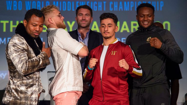 Viddal Riley (far right) trained AnEsonGib to fight Jake Paul