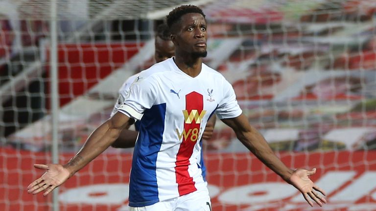 Wilfried Zaha celebrates his second goal of the game