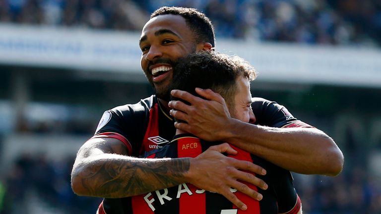  Ryan Fraser of AFC Bournemouth celebrates with teammate Callum Wilson after scoring his team&#39;s second goal during the Premier League match between Brighton & Hove Albion and AFC Bournemouth at American Express Community Stadium on April 13, 2019 in Brighton, United Kingdom.