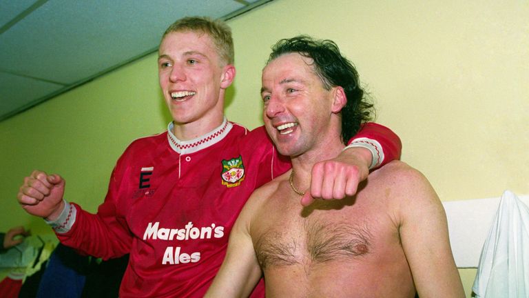 WREXHAM, UNITED KINGDOM - JANUARY 04:  Wrexham goalscorers Steve Watkin (l) and Mickey Thomas celebrate in the dressing room after Division Four side Wrexham had beaten Division One side Arsenal 2-1 in the FA Cup 3rd Round match at the Racecourse Ground on January 4, 1992 in Wrexham, Wales. (Photo by Stephen Munday/Allsport/Getty Images) *** Local Caption *** Steve Watkin; Mickey Thomas