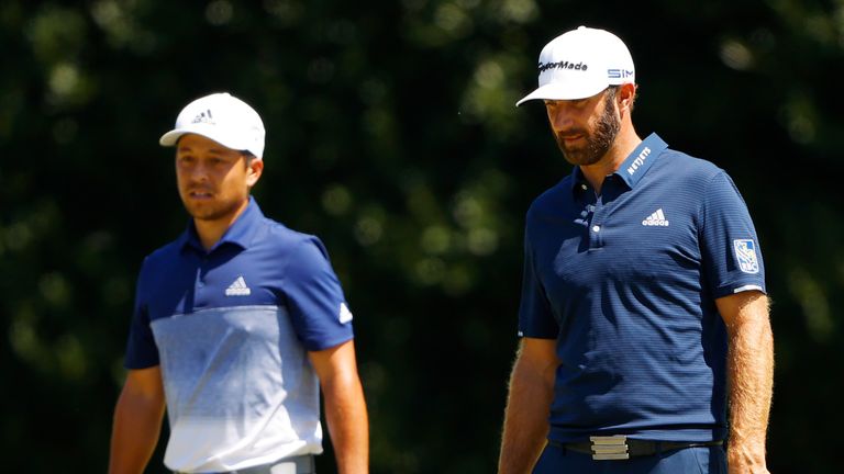 Johnson held off a strong challenge from Xander Schauffele at the Tour Championship