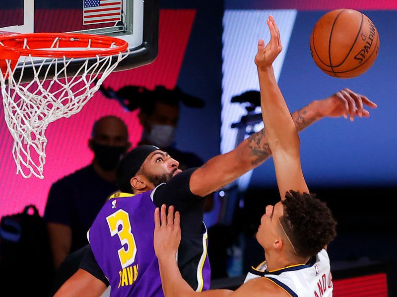 Anthony Davis Los Angeles Lakers Unsigned 2020 NBA Finals Champions Holding Finals Trophy Photograph