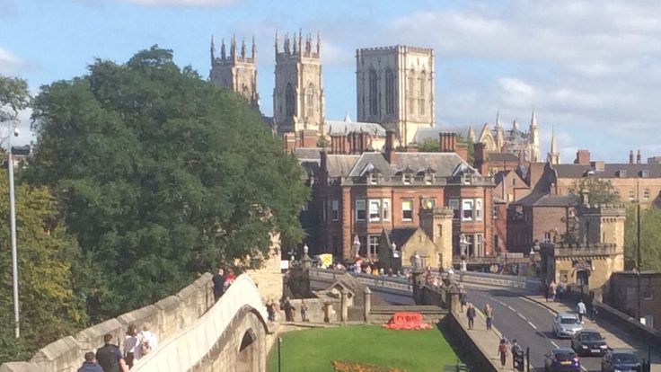 Autumn weather Sept 19th 2020
People walking along a stretch of the city walls enjoying the autumn sunshine in York.