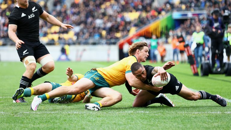 Michael Hooper cannot stop Aaron Smith from scoring for the All Blacks