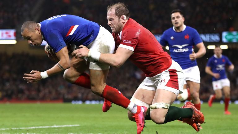 CARDIFF, WALES - FEBRUARY 22: Gael Fickou of France is held by Alun Wyn Jones during the 2020 Guinness Six Nations match between Wales and France at Principality Stadium on February 22, 2020 in Cardiff, Wales. (Photo by David Rogers/Getty Images)