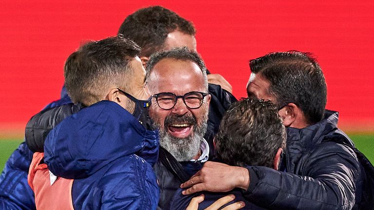 Cadiz manager Alvaro Cervera (centre) celebrates with his team after beating Real Madrid                               