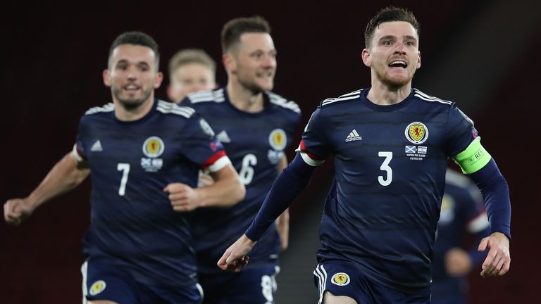 Andy Robertson leads Scotland&#39;s celebrations after beating Israel on penalties