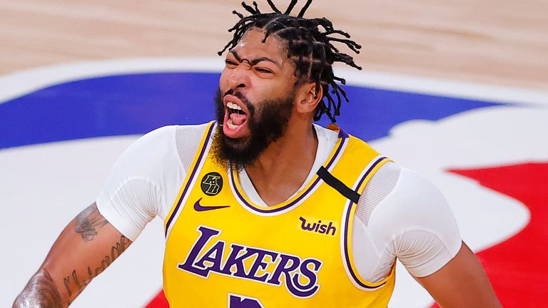 Anthony Davis celebrates a fourth-quarter three-pointer in the Lakers&#39; Game 4 win over the Heat