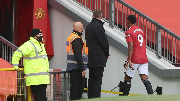 Anthony Martial makes his way down the tunnel following his red card