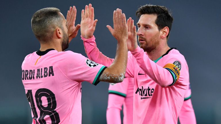 Lionel Messi celebrates after he scored in Barcelona's win at Juventus