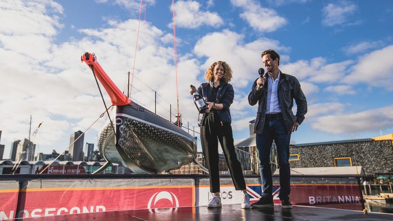 Ben Ainslie with Her Excellency Ms Laura Clarke, British High Commissioner for New Zealand in front of Britannia (Copyright:  Harry KH)