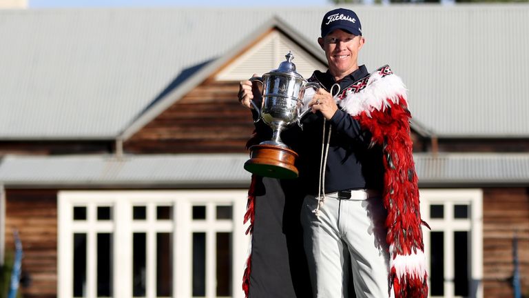 Brad Kennedy of Australia celebrates with the trophy after winning the 2020 New Zealand Golf Open at Millbrook Resort