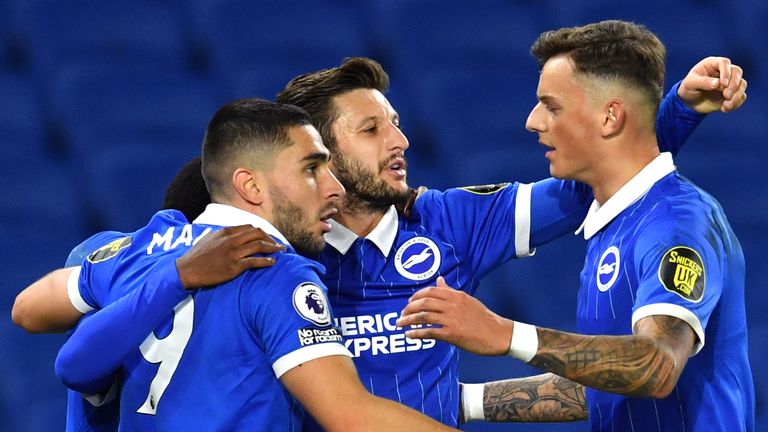 Brighton players celebrate after West Bromwich Albion's Jake Livermore scores an own goal