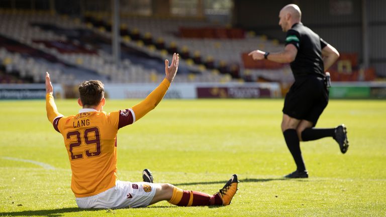 Motherwell's Callum Lang appeals to referee Bobby Madden for a penalty