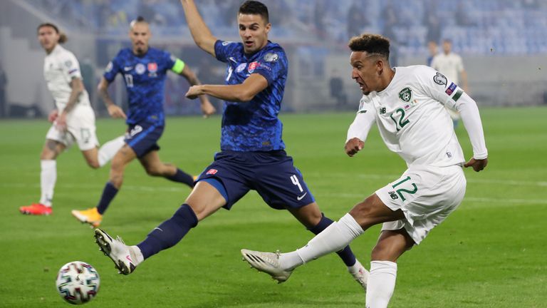 Callum Robinson gets a shot away against Slovakia