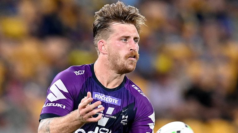 BRISBANE, AUSTRALIA - OCTOBER 03: Cameron Munster of the Storm passes the ball during the NRL Qualifying Final match between the Melbourne Storm and the Parramatta Eels at Suncorp Stadium on October 03, 2020 in Brisbane, Australia. (Photo by Bradley Kanaris/Getty Images)