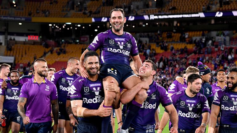 BRISBANE, AUSTRALIA - OCTOBER 16: Cameron Smith of the Storm is chaired from the field after the NRL Preliminary Final match between the Melbourne Storm and the Canberra Raiders at Suncorp Stadium on October 16, 2020 in Brisbane, Australia. (Photo by Bradley Kanaris/Getty Images)