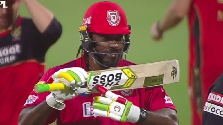 Kings XI's Chris Gayle celebrates reaching fifty in the IPL clash against RCB