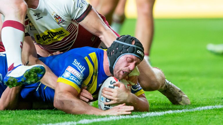 Chris Hill just reached the try-line for Warrington's second try 
