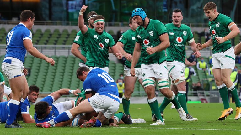 Ireland players celebrate as CJ Stander scores their first try against Italy