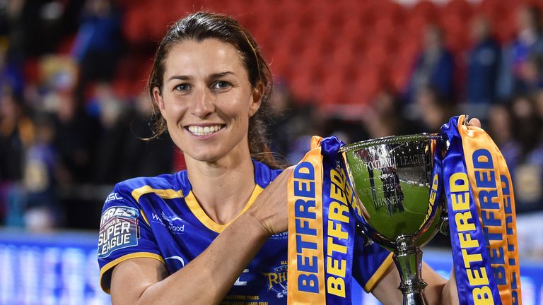 ST HELENS, ENGLAND - OCTOBER 11: Courtney Hill of Leeds Rhinos celebrates after Leeds win the Betfred Womens Supper League cup after the Betfred Womens Super League Grand Final match between Leeds Rhinos and Castleford Tigers at Totally Wicked Stadium on October 11, 2019 in St Helens, England. (Photo by Nathan Stirk/Getty Images)