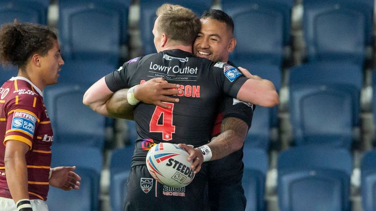 08/10/2020 - Rugby League - Betfred Super League - Huddersfield Giants v Salford Red Devils - Emerald Headingley Stadium, Leeds, England - Salford&#39;s Krisnan Inu is congratulated by Dan Sarginson on his hat-trick of tries against Huddersfield.