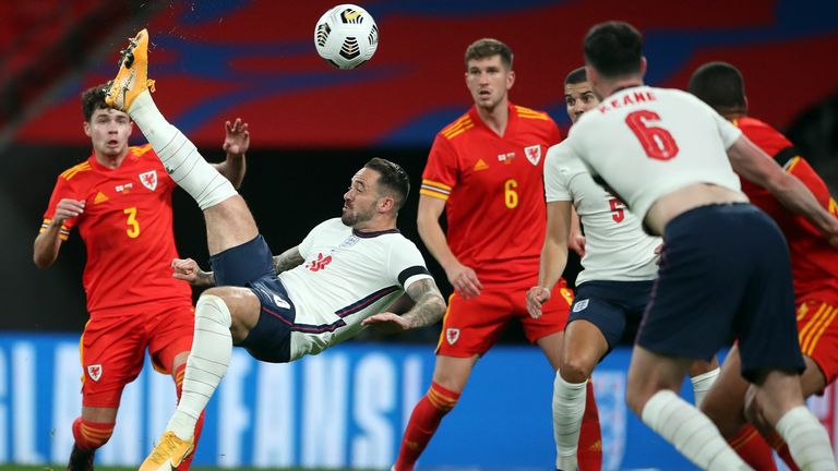 Danny Ings scores an acrobatic third for England against Wales