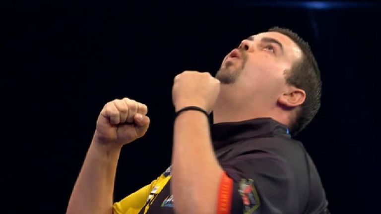 Gabriel Clemens celebrates after beating Nathan Aspinall in the first round of the 2020 World Grand Prix