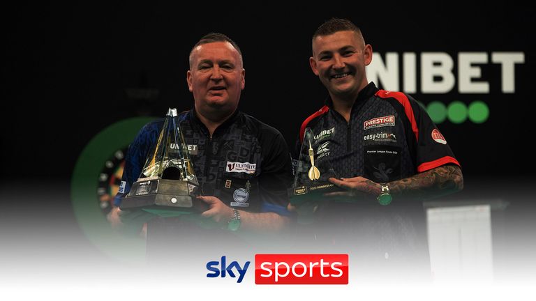 Glen Durrant and Nathan Aspinall after the final of the Premier League Play-Off final. Photo by Lawrence Lustig/PDC