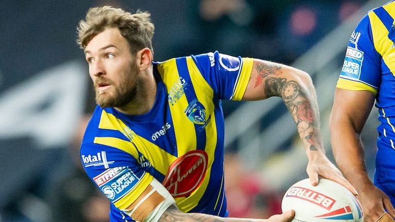 Daryl Clark scored twice as Warrington ground out a key win over Huddersfield