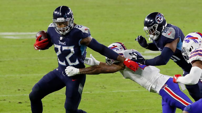 Derrick Henry of the Tennessee Titans runs with the ball in the third quarter against the Buffalo Bills