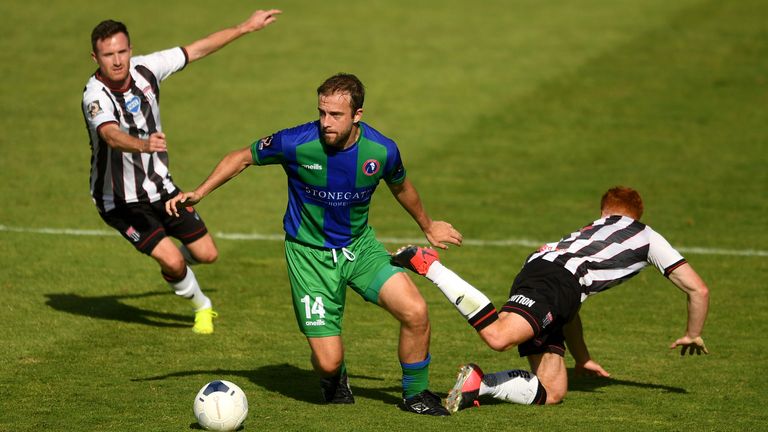 : Tom Smith of Bath City is tackled by Jake Gallagher of Dorking Wanderers during the Vanarama National League South Play-Off match between Bath City and Dorking Wanderers at Twerton Park on July 19, 2020 in Bath, England. (Photo by Harry Trump/Getty Images)