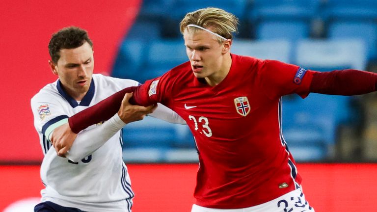 Striker Erling Haaland holds the ball up for a Norway attack in Oslo