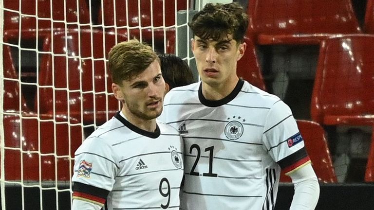 Germany's midfielder Kai Havertz celebrates scoring the 2-2 goal with his team-mate Germany's forward Timo Werner during the UEFA Nations League football match Germany v Switzerland in Cologne, 