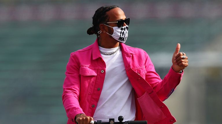 Lewis Hamilton all dressed in pink at Imola