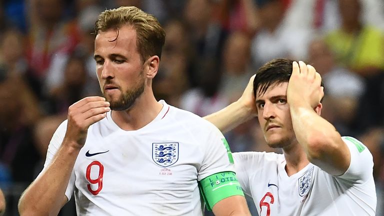 Harry Kane and Harry Kane on England duty, looking despondent