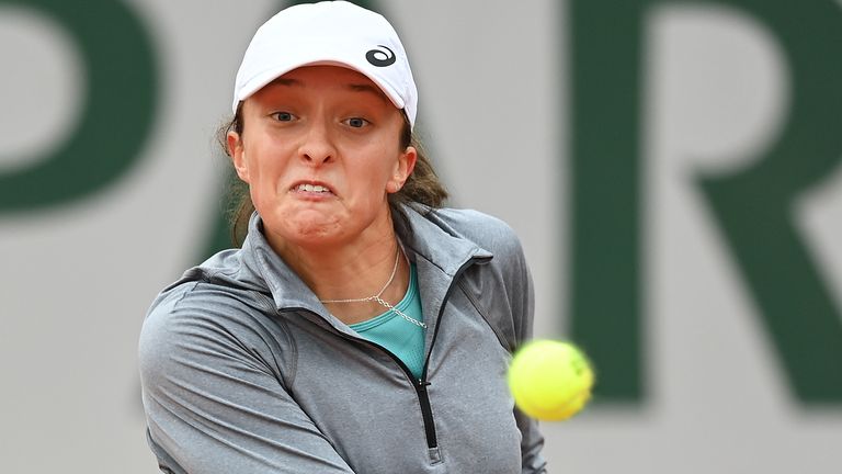 Iga Swiatek of Poland plays a backhand during her Women's Singles first round match against Marketa Vondrousova of Czech Republic on day two of the 2020 French Open at Roland Garros on September 28, 2020 in Paris, France.
