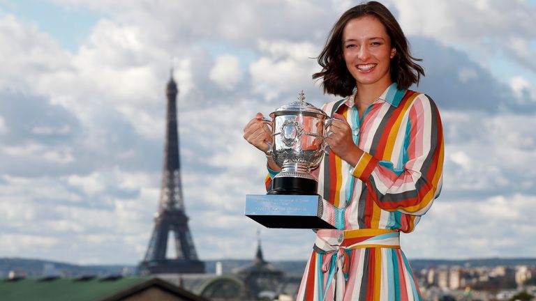 Iga Swiatek of Poland poses on the rooftop of les Galeries Lafayettes Rue de la Chaussee d'Antin with the Suzanne Lenglen Cup following her victory in the Women's Singles Final against Sofia Kenin of The United States of America on day fifteen of the 2020 French Open on October 11, 2020 in Paris, France