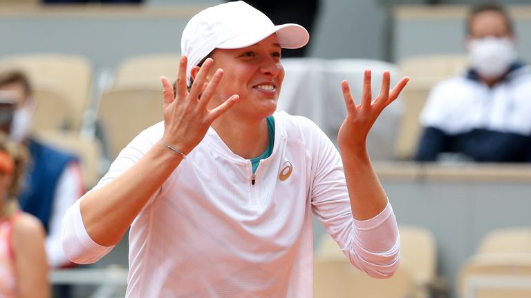 Iga Swiatek of Poland celebrates winning the women's final of the French Open during day 14 of the 2020 French Open on Court Philippe Chatrier at Roland Garros stadium on October 10, 2020 in Paris, France
