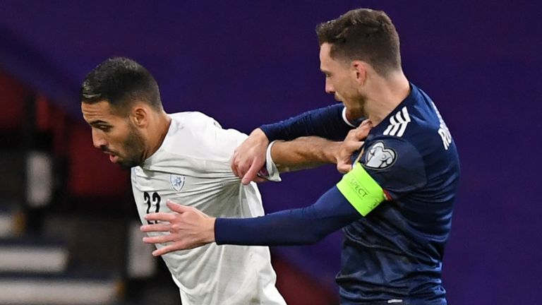 Israel midfielder Eyal Golasa vies with Scotland defender Andrew Robertson