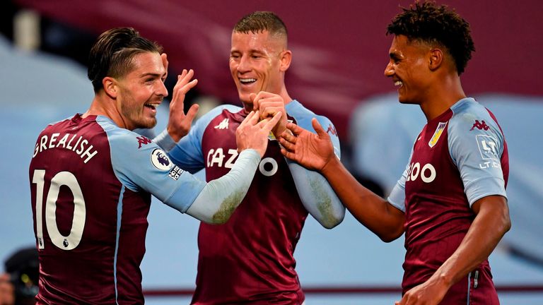 Jack Grealish celebrates with Ross Barkley and Ollie Watkins