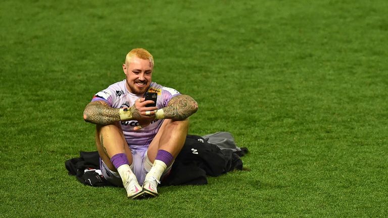 Jack Nowell makes a phone call after winning the European Champions Cup