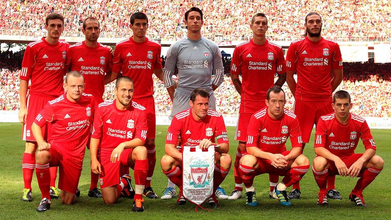 Jack Robinson (left of back row) lines up alongside Jamie Carragher in a pre-season friendly match in Malaysia in 2011