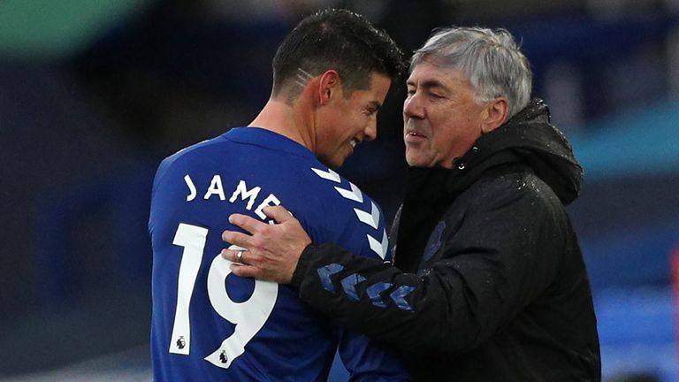 James Rodriguez is congratulated by Carlo Ancelotti as he's substituted in the second-half