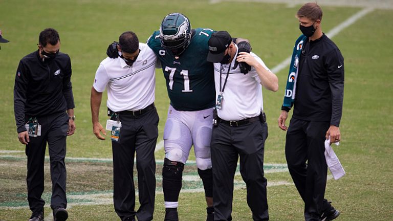 PHILADELPHIA, PA - SEPTEMBER 27: Jason Peters #71 of the Philadelphia Eagles is helped off the field after an injury against the Cincinnati Bengals in the overtime at Lincoln Financial Field on September 27, 2020 in Philadelphia, Pennsylvania. The Bengals tied the Eagles 23-23. (Photo by Mitchell Leff/Getty Images)