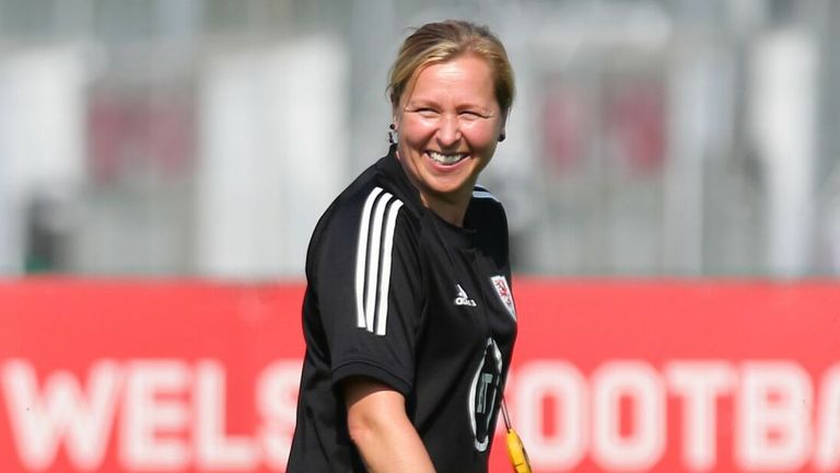 Wales Women manager Jayne Ludlow smiles during training